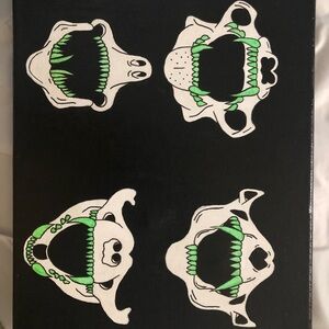 Black Canvas with Green and White Skull Art